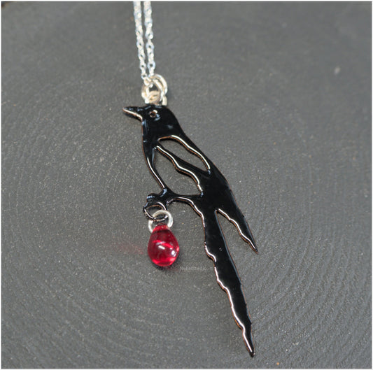 Colgante y pendientes Urraca