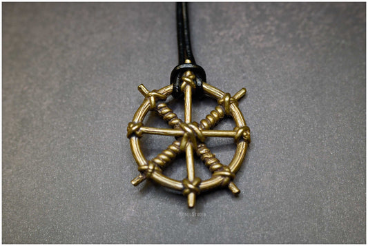Colgante Rueda del Dolor bronce frente