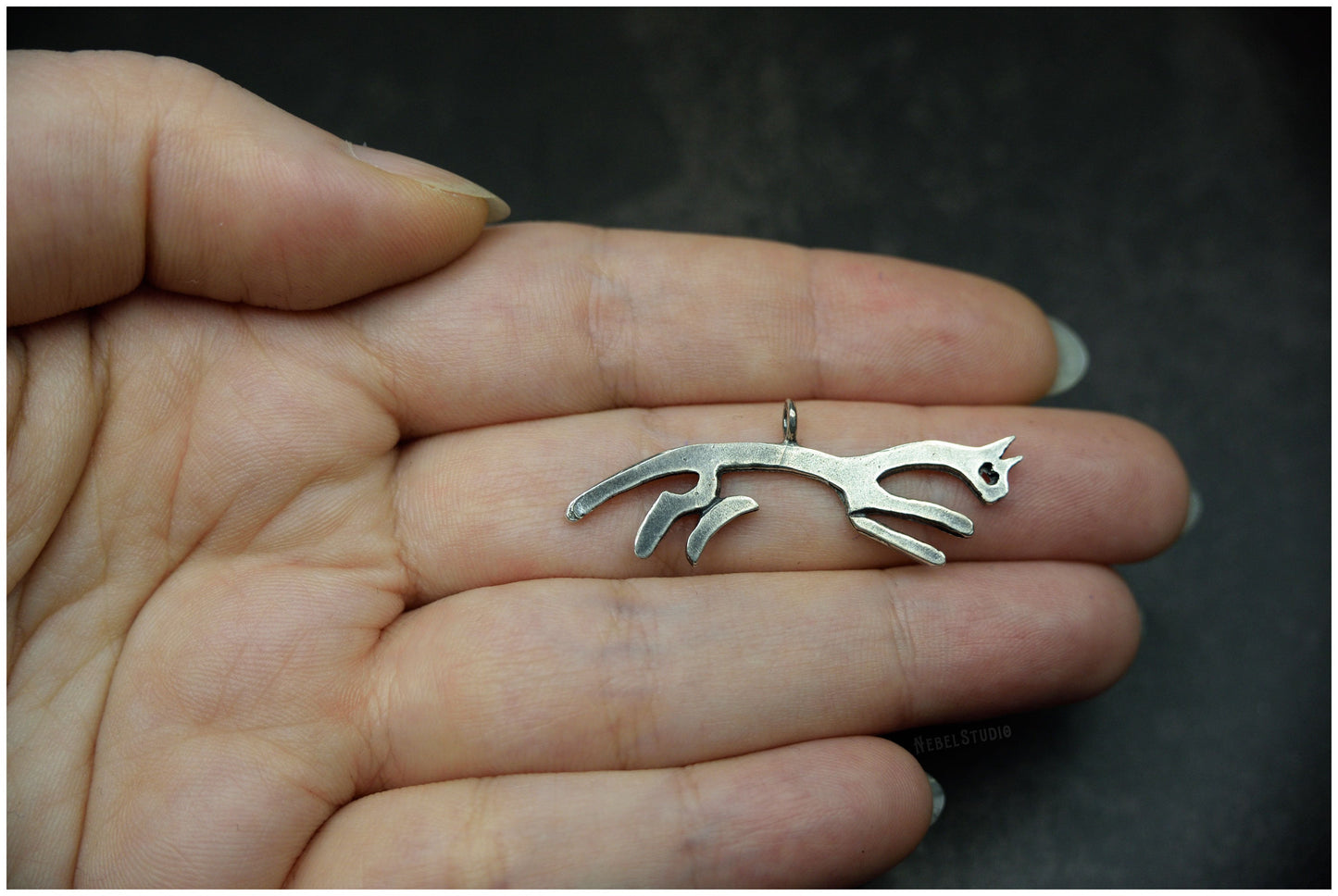 Colgante caballo plata proporciones