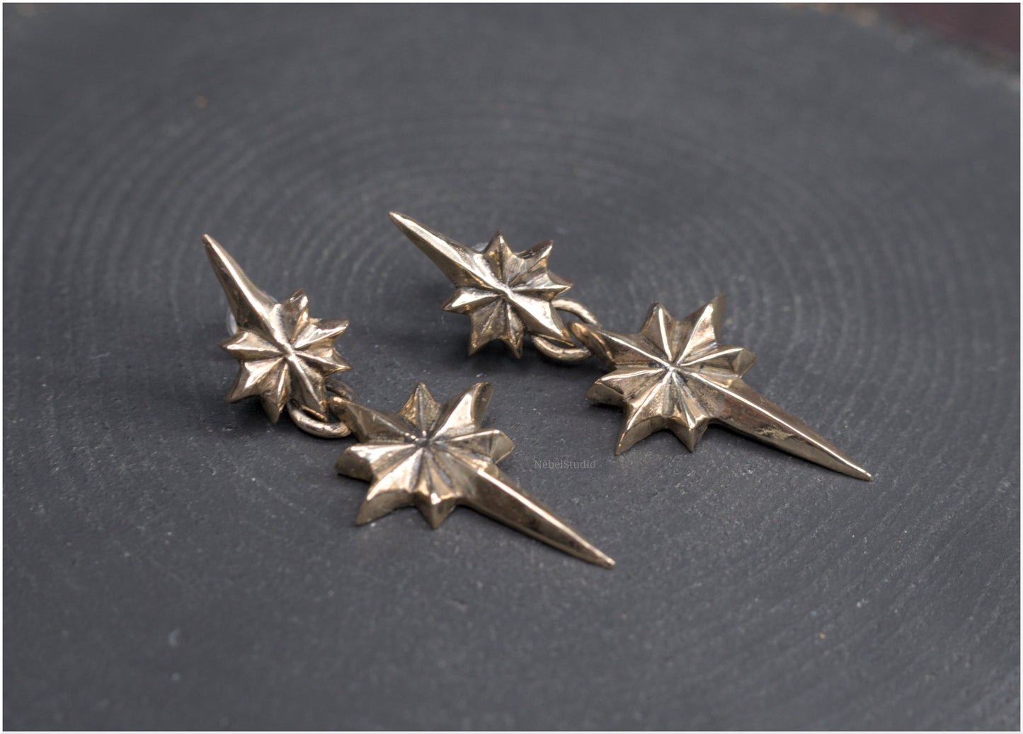 Pendientes estrellas dobles Ad Astra tamaño mediano bronce