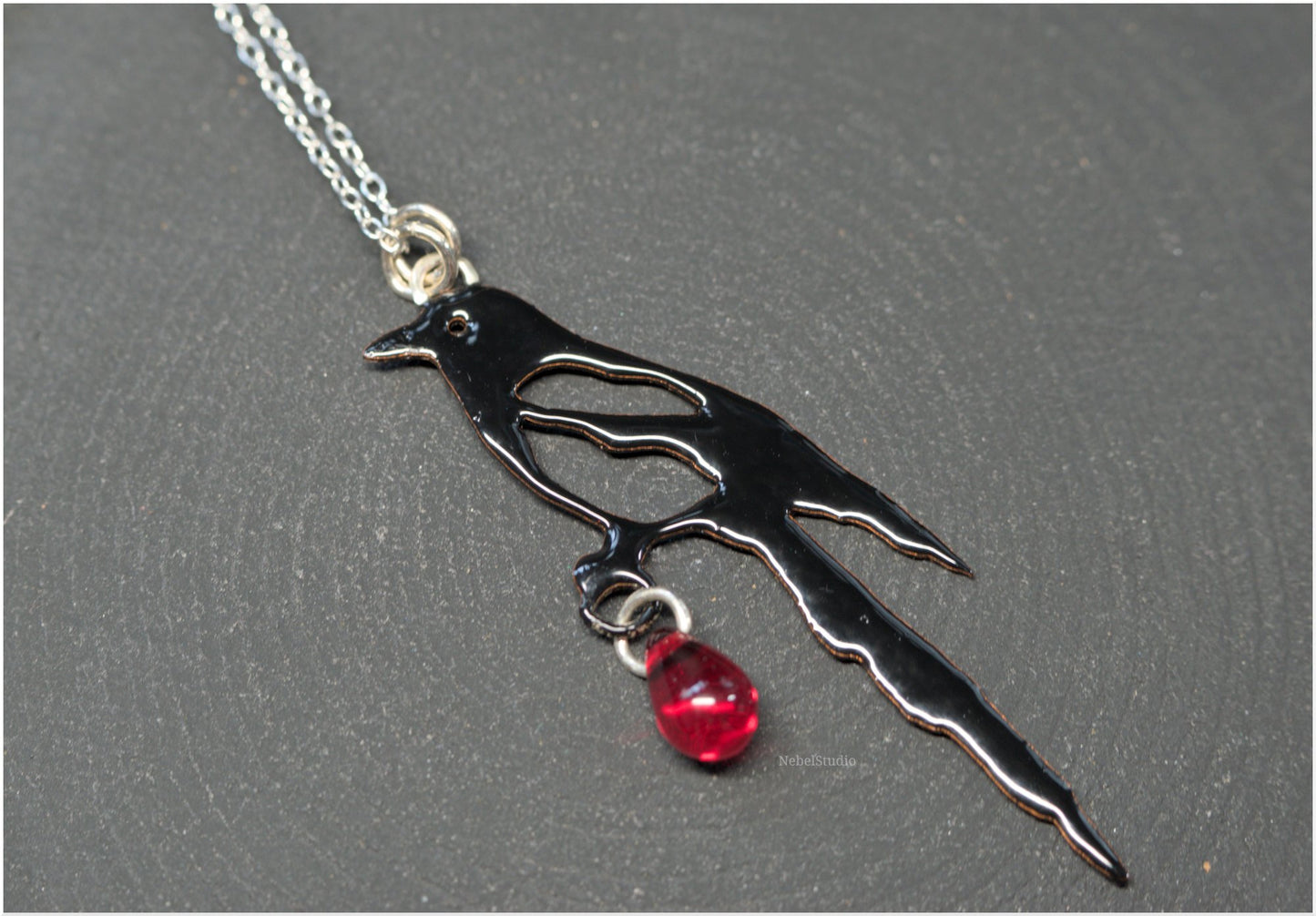 Colgante y pendientes Urraca