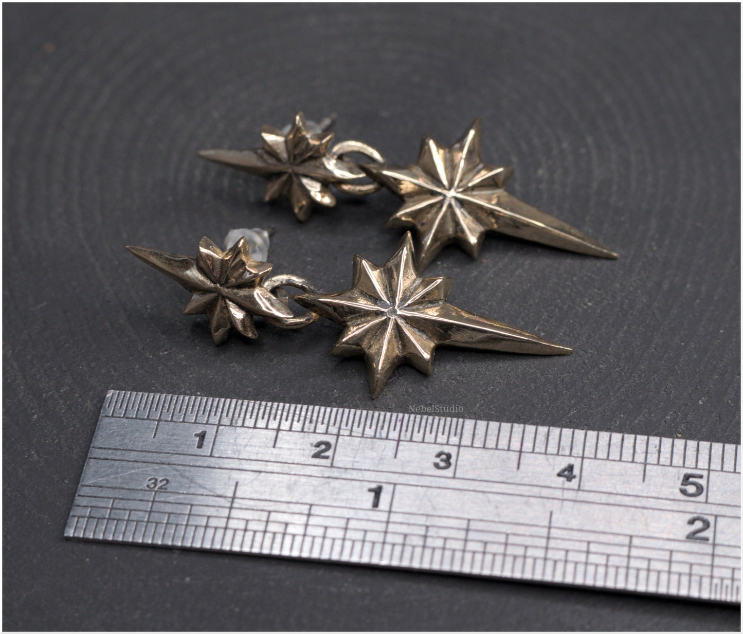 Pendientes estrellas dobles Ad Astra tamaño mediano bronce