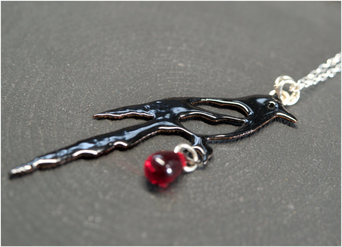 Colgante y pendientes Urraca