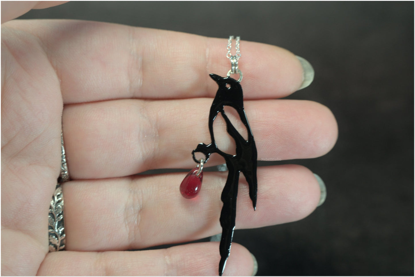 Colgante y pendientes Urraca