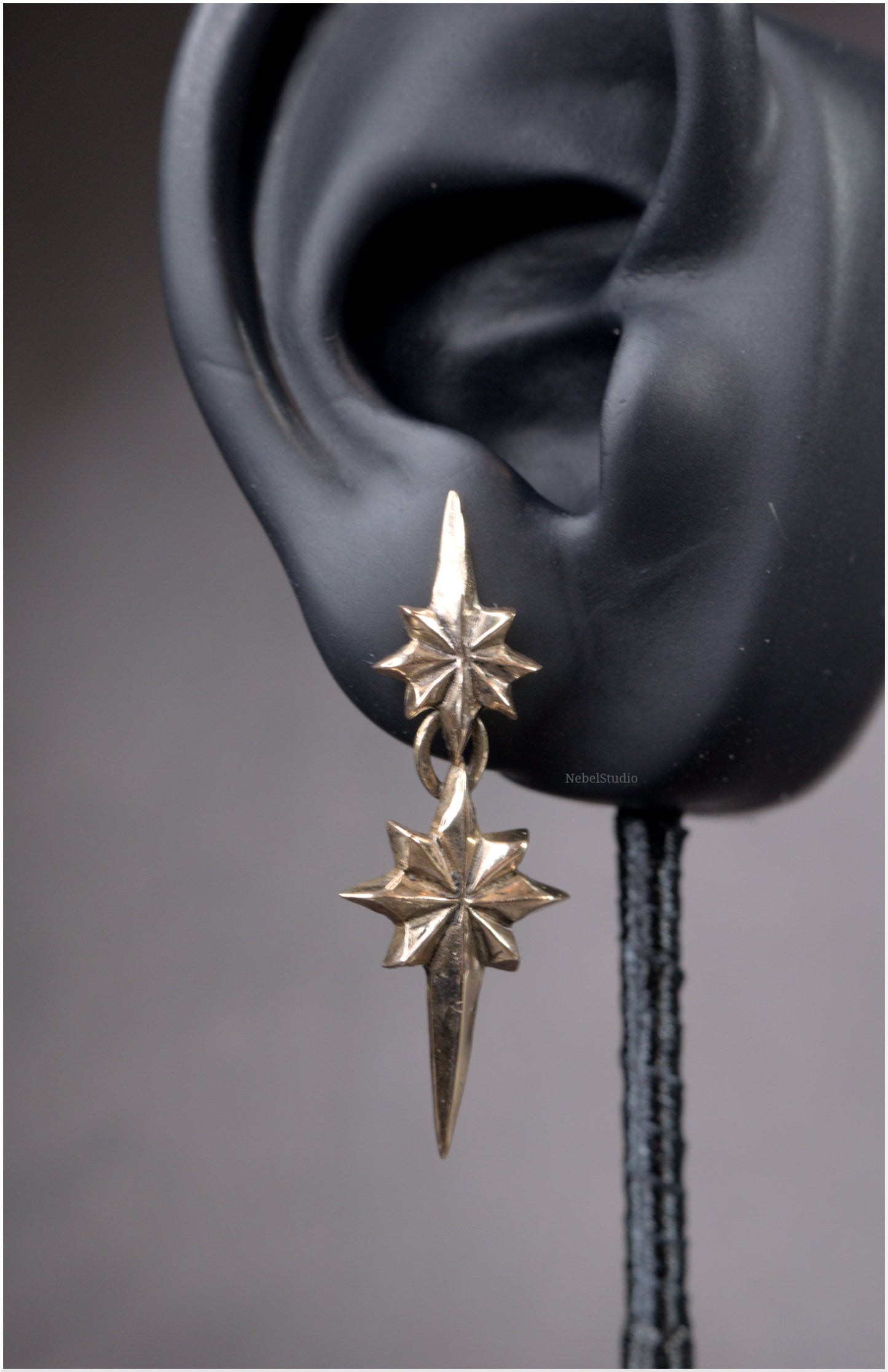 Pendientes estrellas dobles Ad Astra tamaño mediano bronce