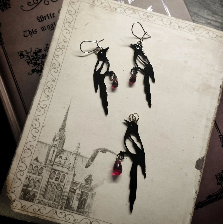 Colgante y pendientes Urraca