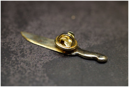 Pin cuchillo Eat the Rude bronce reverso