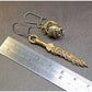 Pendientes Inefables espada serpiente manzana bronce medidas