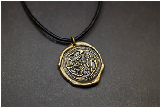 Colgante Gatos entrelazados nudo celta Pangur Bán bronce cordón cuero